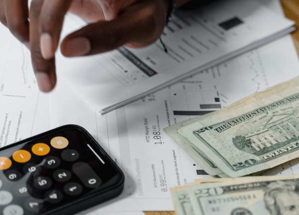 Person using a phone calculator